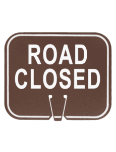 Picture of brown clip-on sign with the legend "Road Closed" scribed in white ink.